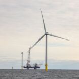 a wind turbine in the ocean
